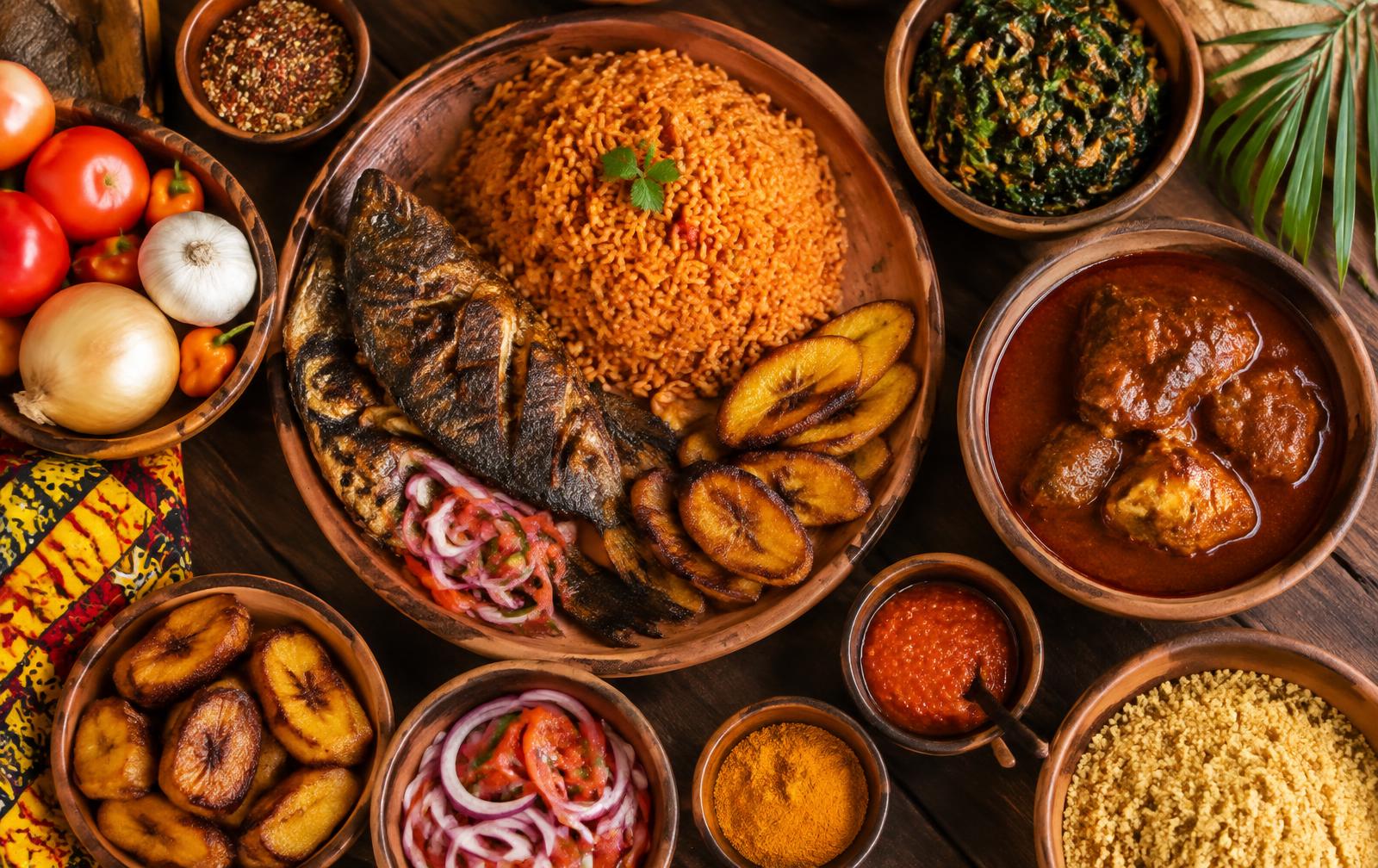 A spread of West African dishes served in earthenware bowls